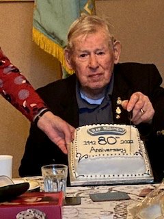 Allen Perry cutting the RAF Regiment 80th Anniversary Celebration cake.